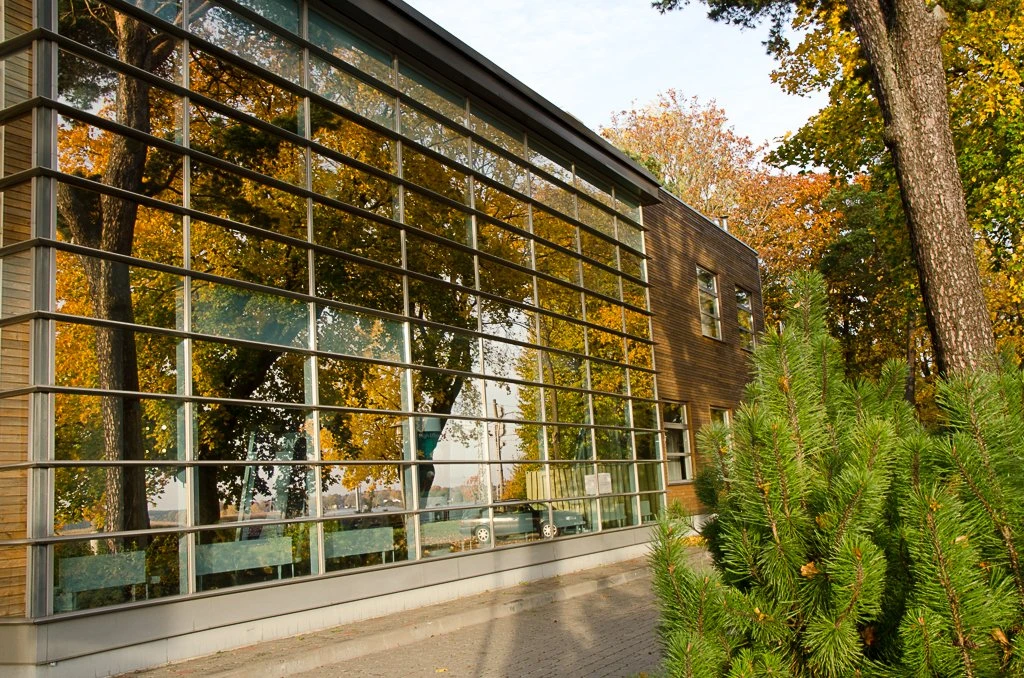 Reflective window film on office building glazing